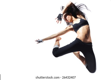 modern style dancer jumping behind studio background - Powered by Shutterstock