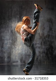 modern style dancer posing on studio background - Shutterstock ID 31718353