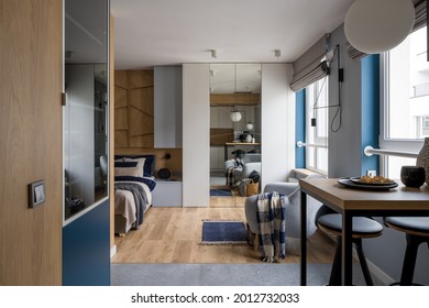 Modern And Stylish Single Studio Apartment With Bedroom Open To Kitchen Area With Table
