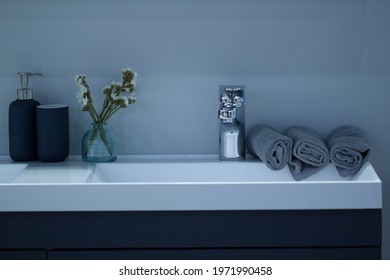 Modern Stylish Washstand With Clean Towels Laid On It In A Clean Bathroom Of A Cozy Apartment Or Hotel 