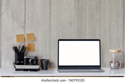 Modern And Stylish Workspace With Laptop Computer, Office Supplies, Books, Retro Camera At Home Or Studio. Mock Up Desk Concept.