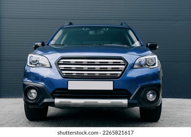 Modern subcompact crossover SUV,  beautiful wheels, large chrome grille.