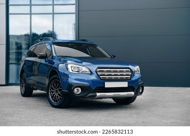Modern subcompact crossover SUV,  beautiful wheels, large chrome grille. - Powered by Shutterstock