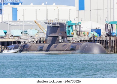 Modern Submarine Under Maintence In A Naval Shipyard