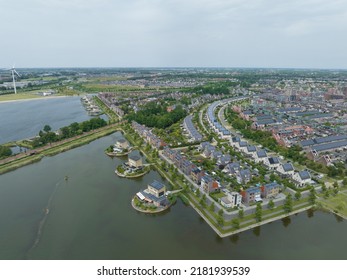 Modern Suburb Residential Sustainable Housing Village In Heerhugowaard, The Netherlands. Urban Real Estate Household Neighbourhood Overhead Aerial Panorama Drone View