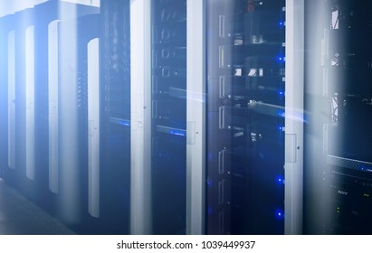 Modern supercomputers in computational data center. Server room. Web internet and network telecommunication technology, big data storage and cloud computing computer service business concept.
