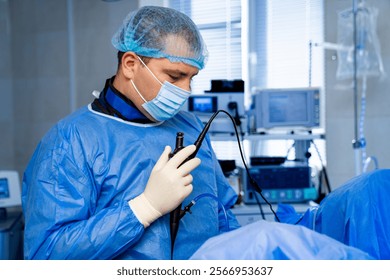 Modern surgery in progress. A medical professional in surgical attire is performing a procedure in a high-tech operating room filled with equipment. - Powered by Shutterstock