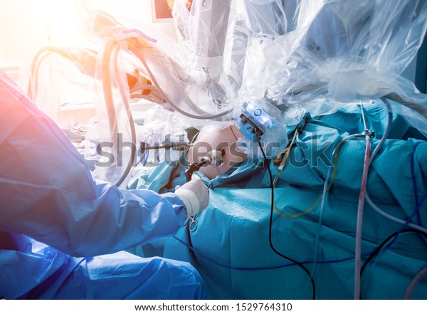 Modern surgical system. Medical robot.\
Minimally invasive robotic surgery. Medical\
background