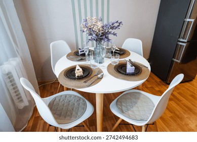 Modern Table Setup For Meals, Elegant And Contemporary Dining Table Design, Sophisticated Modern Table Arrangement With Stylish Seats And Harmonious Decorative Elements For Enjoyment