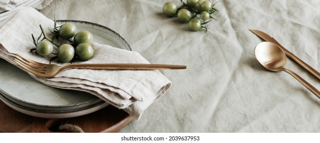 Modern tableware and cutlery on beige linen tablecloth table banner .Trendy scandinavian style.Space for text or menu . Business food brand template. - Shutterstock ID 2039637953