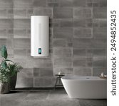 Modern tanked boiler in bathroom. Household smart water heater hanging on the wall in boiler room. Common electric storage tank water heater. Energy-efficient home heating system on gray tiles