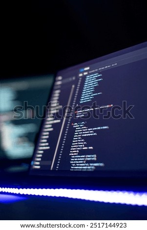 Modern tech. PHP syntax highlighted. Writing programming functions on laptop.