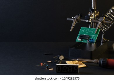 Modern technologies. The components of the main board in the process of assembling the finished device for further use.