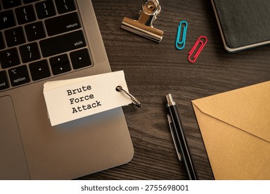 Modern technology concept of Brute Force Attack on word card with laptop, clips, pen. Digital innovation and connectivity visualization.