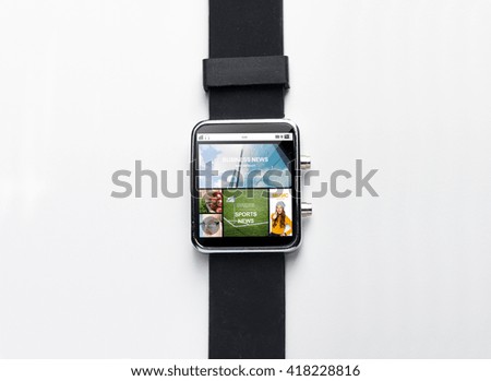modern technology, object and media concept - close up of black smart watch with internet applications on screen