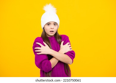 Modern Teen Girl Wearing Sweater And Knitted Hat On Isolated Yellow Background. Angry Teenager Girl, Upset And Unhappy Negative Emotion.