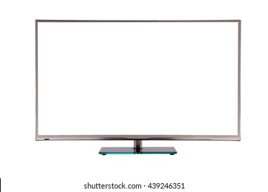 Modern Thin Plasma LCD TV On A Silver Black Glass Stand Isolated On A White Background, Standing On The Background Screen To The Viewer