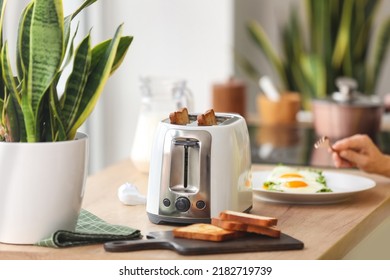 Modern Toaster On Kitchen Table