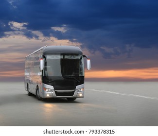 modern tourist bus on asphalt in the evening on sunset