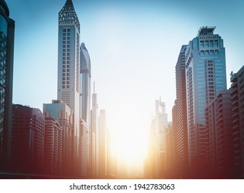 Modern Towers Of Skyscrapers Buildings In Dubai City Downtown Or Center. Fast Industrial, Business Activity And Economic Development Concept