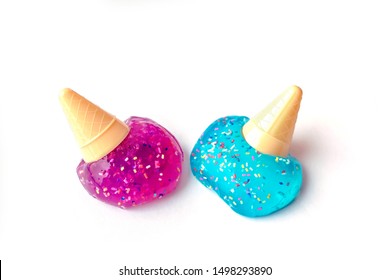Modern toy for kids called slime. Ice cream made of transparent purple and blue slime. Mucus isolated on a white background.  - Shutterstock ID 1498293890