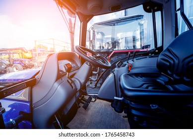 Modern Tractor Cabin Interior. Agricultural Exhibition. Industrial