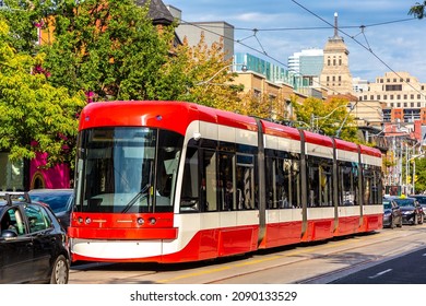 Modern tram in Toronto in a sunny day, Ontario, Canada