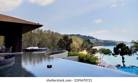 Modern Tropical Resort With Sea View. Decorative Swimming Pool Near Hotel Lobby With Blue Ocean View. Concept Of Summer Holidays And Vacation.