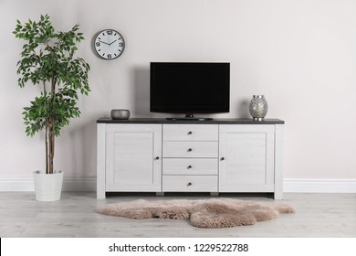 Modern TV set in living room interior - Powered by Shutterstock