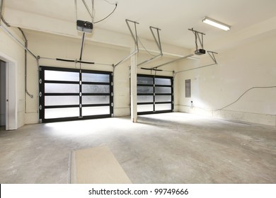 Modern Two Cars Garage With Glass Doors.