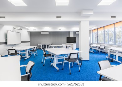 Modern University Group Study Room With White Desks And Chairs