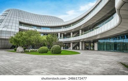 Modern Urban Landscape with Curved Building and Green Courtyard - Powered by Shutterstock