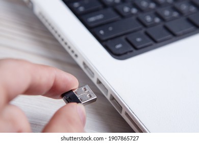 Modern USB Drive On Laptop Keyboard