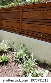 Modern Variable Width Redwood Fence