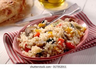 Modern Vegetarian Quinoa Menu With Aubergine, Peppers And Cougars With Bread And Oil.