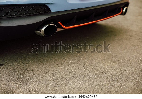 Modern Vehicle Sport Exhaust System. Exhaust End Closeup\
Photo. sports car 
