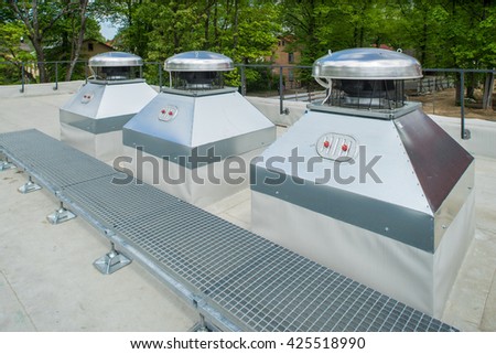 Modern ventilation system on the roof of the building.