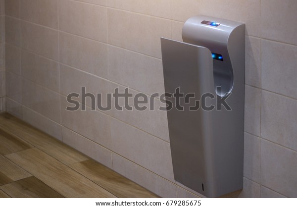 \
\
Modern vertical hand dryer in public restroom\
WC\
