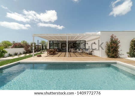 Modern villa with pool and deck with interior
