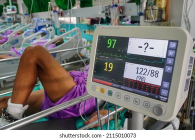 Modern Vital Sign Monitor On Patient Background At Ward In The Hospital.