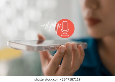 Modern Voice Recording, Hand Holding Microphone Icon on Smartphone Capture Sound Music and Voice Messages with this Voice Recording App. Use AI Enabled Internet Search for Easy Access to Information.