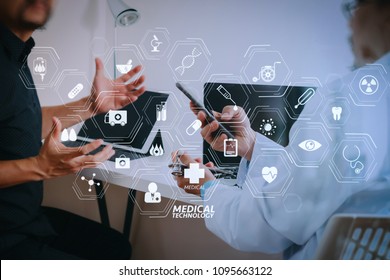 Modern VR with medical technology diagram concept.Medical doctor in white uniform gown coat consulting businessman patient having exam as Hospital professionalism concept. 