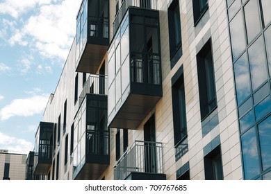 Modern Wall. Abstract architectural pattern with dark toned windows - Shutterstock ID 709767685