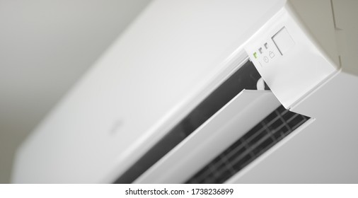 Modern Wall Mounted Air Conditioner In Action, Close-up Shot