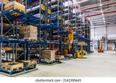 Modern Warehouse Interior With Shelves And Boxes