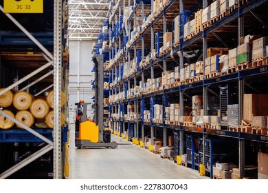 Modern warehouse interior with shelves and boxes and forklift loader - Powered by Shutterstock