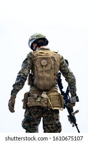 Modern Warfare Soldier Going In Battle Rear View Concept Of Future And Hope