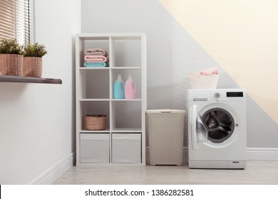 Modern Washing Machine In Laundry Room Interior