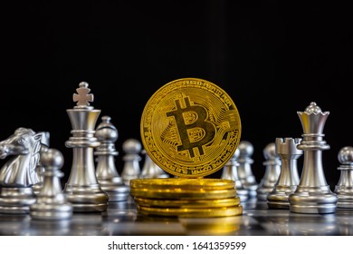 Modern way of exchange. Bitcoin is convenient payment in economy market. Virtual digital currency and financial investment trade concept. Abstract cryptocurrency with gold bitcoin and chess background