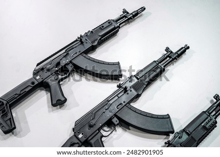 Modern weapons automatic rifles and machine gun on the counter. Firearms for the army and police